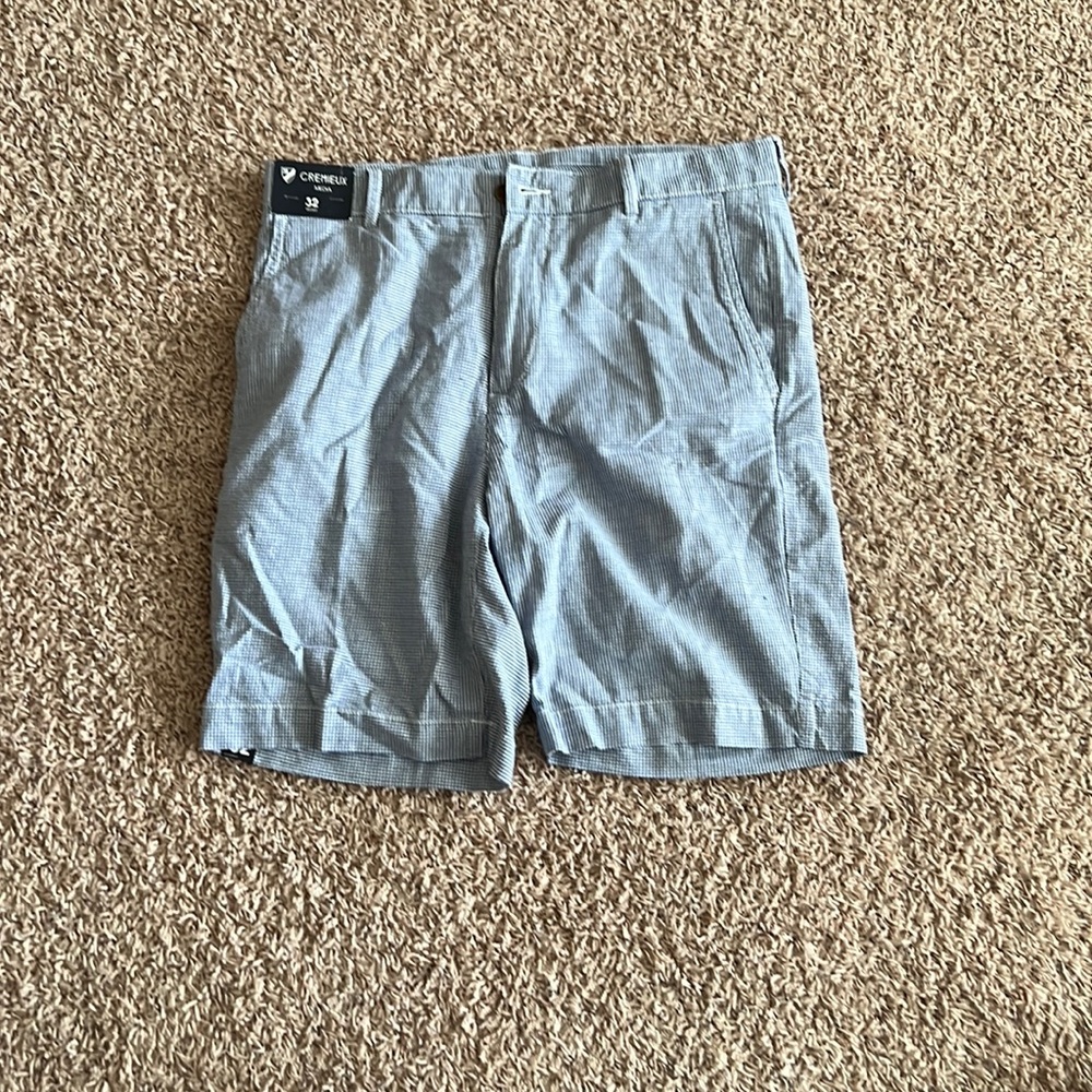New blue and white cargo shorts size 32.